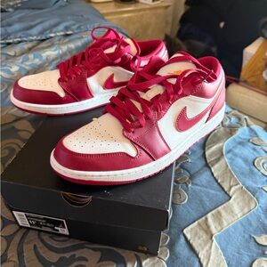 Nike Jordan 1 Crimson and White Athletic Shoes.
